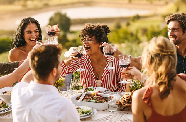 dinner friends shutterstock_1293002518 760x500