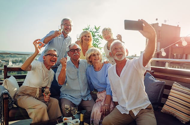 senior group selfie sun iStock-1054444342 760x500