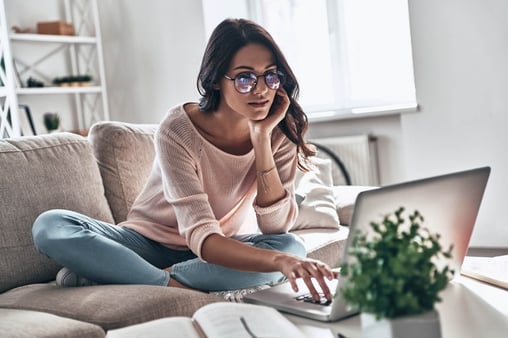 woman with computer shutterstock_1220809918 700x467